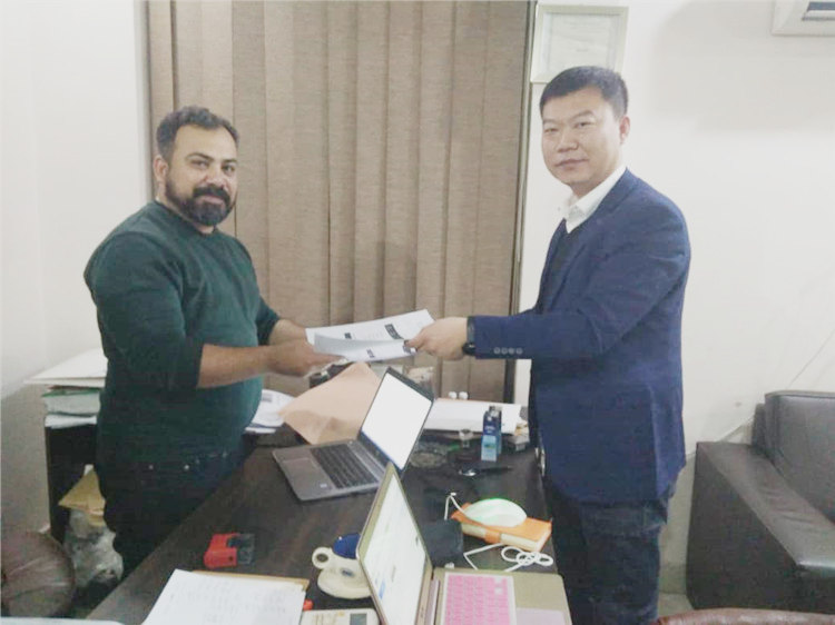 Warmly celebrate our company signed the contract about the Eblow Machine and Pipe Fittings.jpg